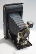 A Kodak folding bellows camera,