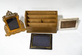 A 19th century brass pierced and engraved photograph frame with easel back, 28cm high,