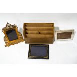 A 19th century brass pierced and engraved photograph frame with easel back, 28cm high,