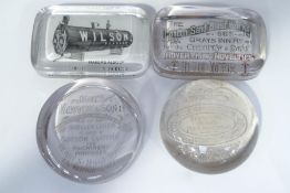 Four Edwardian glass advertising paperweights: Wilson, makers of Kestner Patent Water Tube Boilers,
