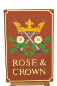 A large Rose & Crown wooden sign, hand painted on both sides,