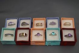 A collection of ten silver rings,