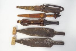 Three Sudanese daggers in crocodile skin sheaths,