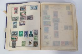 A Triumph stamp album with many well filled inserted extra pages,