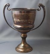 A silver two handled trophy cup, 28.5 cm high, 594 g (19.
