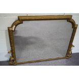 A Victorian over-mantel mirror, the plaster frame later gold painted, 96.