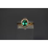 A 9 carat synthetic stone cluster ring,