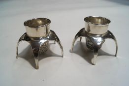 A pair of Retro plated candlesticks, in the form of spaceships, 'patent design' to underside,