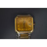 Omega Deville, a gentleman's gilt quartz dress wrist watch,