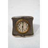 A lady's silver purse/clock travelling clock, H.Matthews, Birmingham 1923, 4.