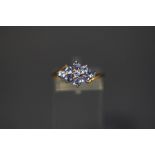 A QVC 9 carat gold tanzanite nine stone cluster ring, finger size P, 2.