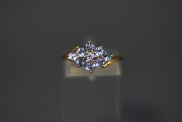 A QVC 9 carat gold tanzanite nine stone cluster ring, finger size P, 2.