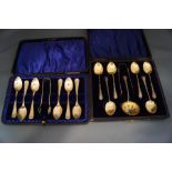 A set of six silver tea spoons, with sugar tongs and sifting spoons, by William Devenport,