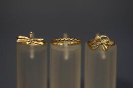 A 9 carat gold dragonfly ring; with another similar; 3 g gross;