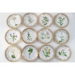 A set of twelve Royal Copenhagen Flora Danica dessert plates,