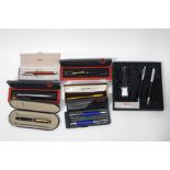 A collection of Rotring fountain pens, roller ball pens and pencils,