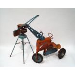 A vintage Tri-ang child's pedal 'Super Tractor' and a related farm crane,