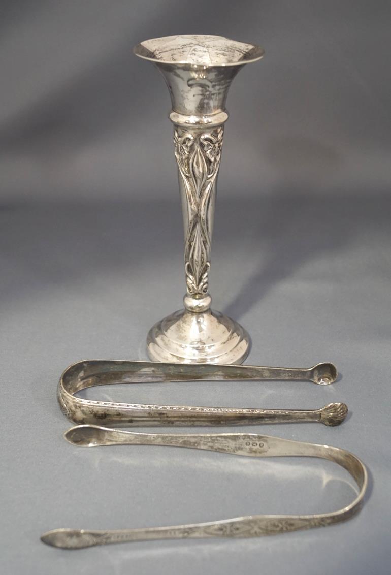 A late 18th century Irish silver pair of bright cut sugar tongs, by Benjamin Tate, Dublin,