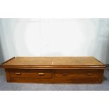 A pine and mahogany Captains' bed, with two drawers to the base,