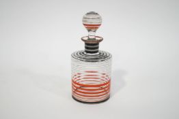 An Art Deco glass perfume bottle and stopper, with red, white and black banding,
