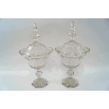 A pair of 19th century cut glass pedestal bowls and covers,