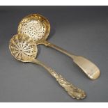 A Victorian silver sifting spoon, by Georg Adams, London 1862, fiddle pattern,