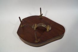 A 19th century mahogany flower press with leather handle and titled "Flagengers" in gilt, 39cm x 30.