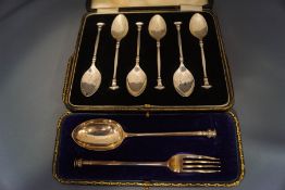 A cased set of six silver seal top tea spoons,