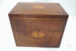 A George III mahogany two handled box, with shell inlay, feather and rosewood banding,