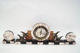 An Art deco style clock garniture with pink marble and slate case with patinated spelter birds