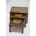 A set of three modern mahogany and brass mounted coffee tables, with inset reproduction maps,