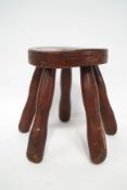 An 18th century painted stool,