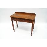 A Victorian mahogany sidetable with two drawers, upon turned legs,