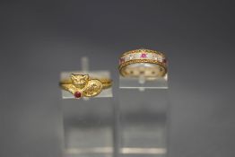 A cat ring, stamped '333'; with a 9 carat two colour gold stone set eternity ring; 3.