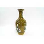 A modern Chinese baluster vase, decorated with famille verte vases over a sage green ground,