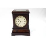 A 19th century mahogany cased library clock, the eight day double fusee movement striking on a bell,
