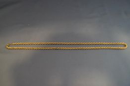 A chain, stamped '750', of hollow rope links, 60 cm long, 16.