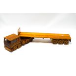 A modern pine child's wooden toy truck, 78cm long, and trailer,
