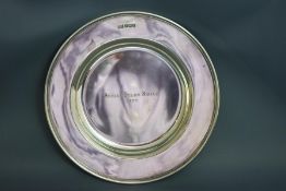 A silver dessert dish, by Walker & Hall, Sheffield 1926, with moulded rim, inscribed, 302 g (9.