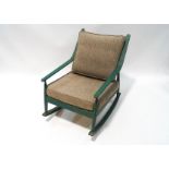 A 1960's Scandart rocking chair, painted green,