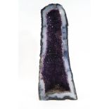 A cut and polished amethyst geode,