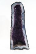 A cut and polished amethyst geode,