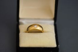 An 18ct gold single stone diamond gypsy ring, Birmingham 1900,
