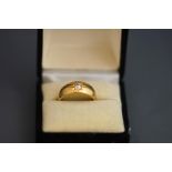 An 18ct gold single stone diamond gypsy ring, Birmingham 1900,