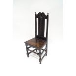 A Victorian carved oak side chair in the 17th century style,