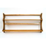 An Ercol 'Golden Dawn' plate rack,