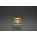 A 22ct gold wedding ring, 5.