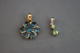 A 9 carat gold gem set pendant; and another gem set pendant stamped '9k'; 4.