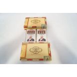 An unopened box of twenty-five La Tropical De Luxe Jamaican cigars,