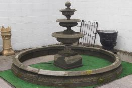 A circular Victorian style stone pond surround, approximately 265cm diameter,